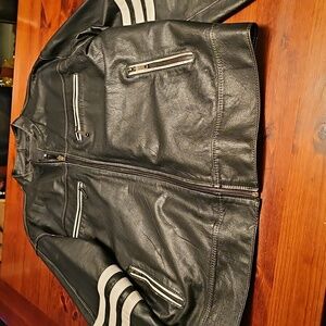 Mens leather jacket with white leather details.